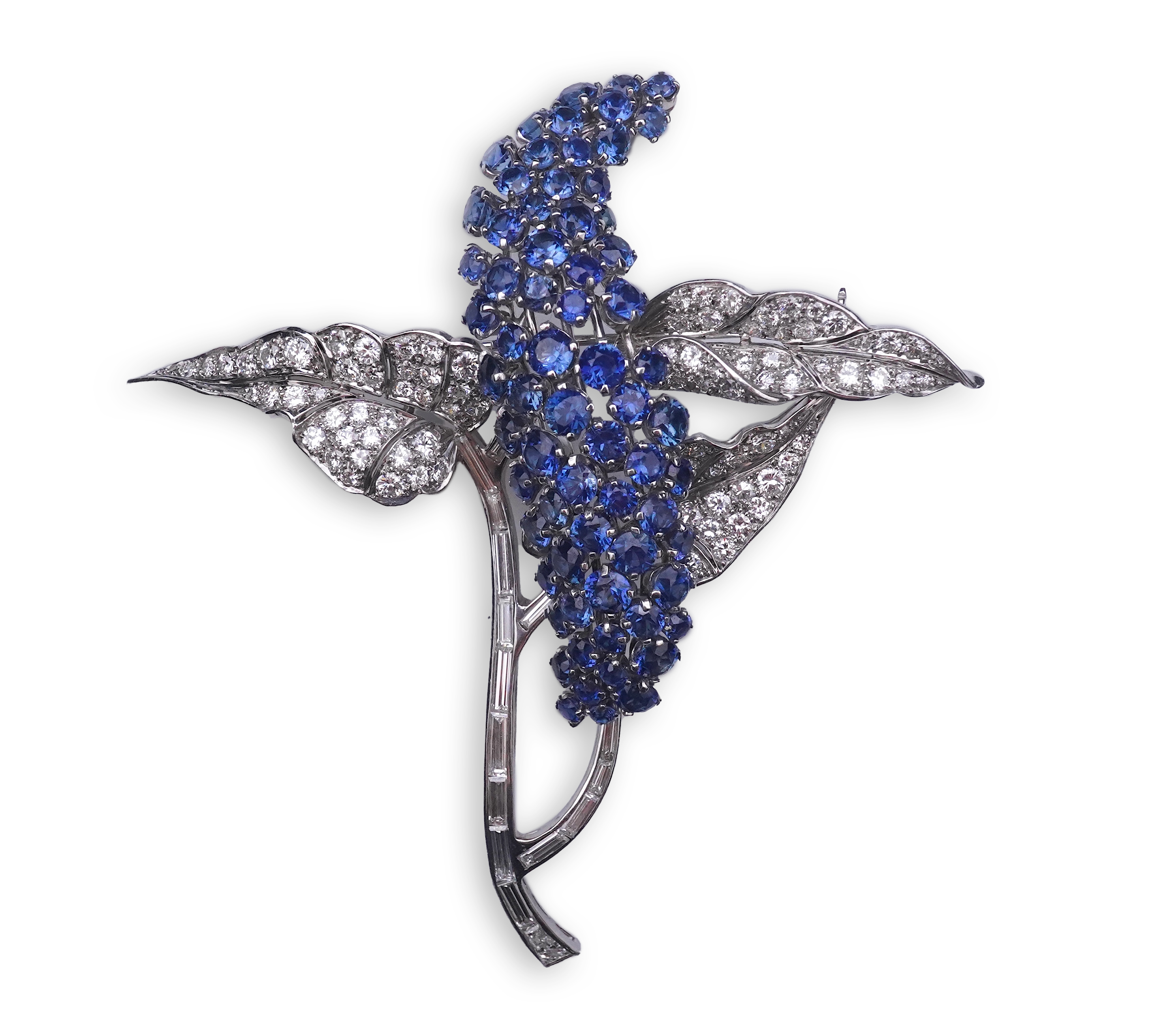 A sapphire and diamond brooch, mid 20th century